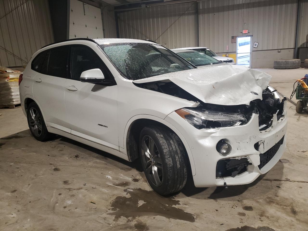 2017 BMW X1 VIN WBXHT3C34H5F82903 Copart auction photo, front end damage thumbnail 4