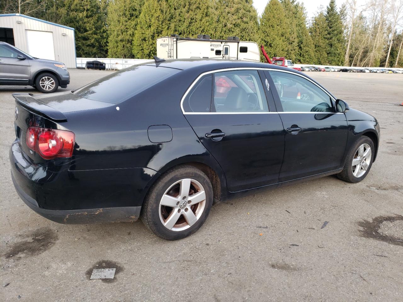2009 Volkswagen Jetta VIN 3VWRZ71K89M086171 Copart auction photo, rear end damage thumbnail 3