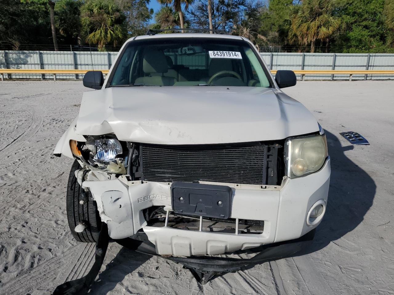 2010 Ford Escape VIN 1FMCU0DG3AKA95311 Copart auction photo, front end / minor dent/scratches damage thumbnail 5