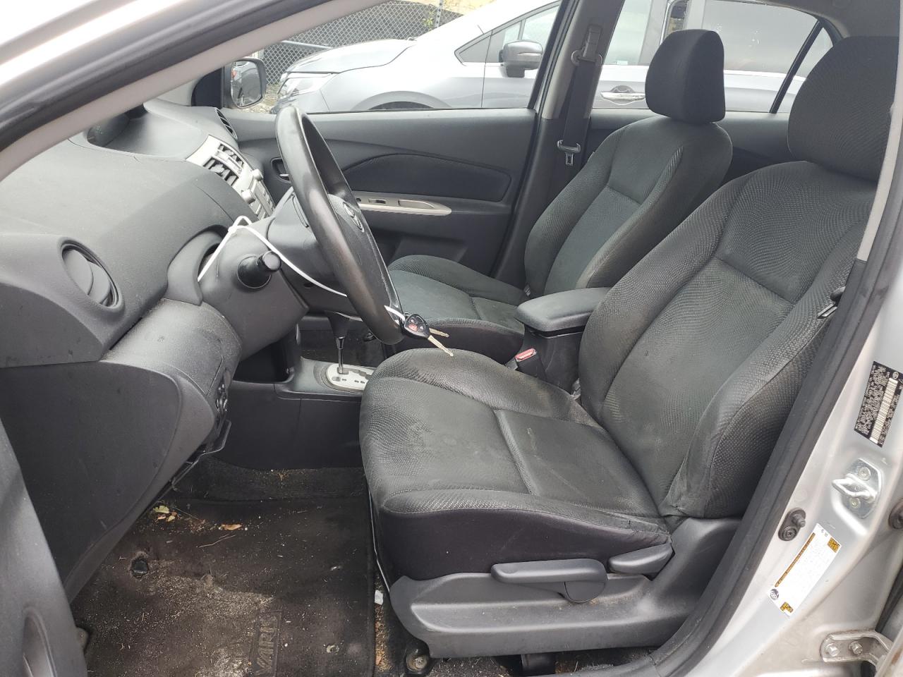 2009 Toyota Yaris VIN JTDBT903291300449 Copart auction photo, side / minor dent/scratches damage thumbnail 7