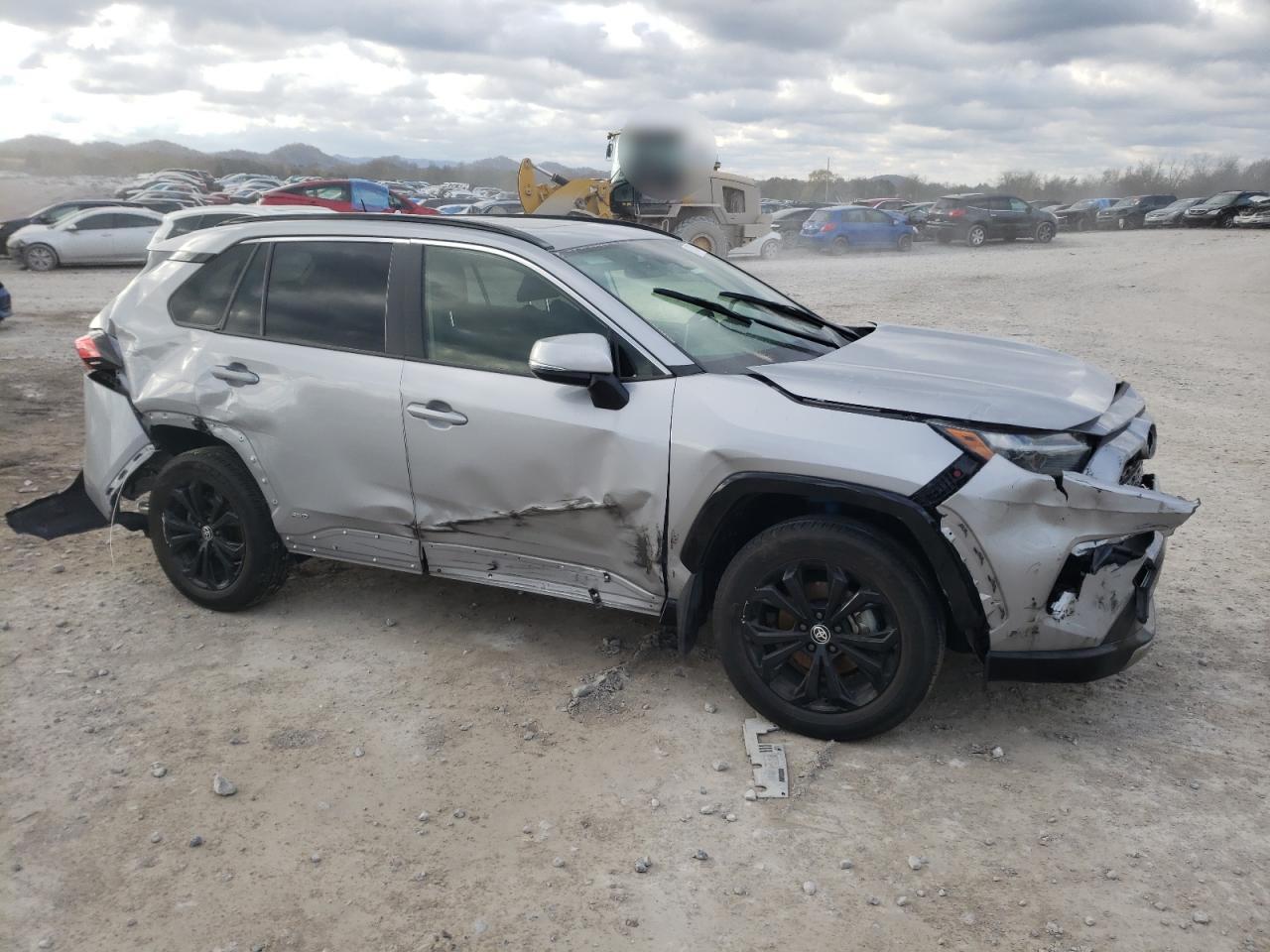 2022 Toyota RAV 4 VIN JTM16RFV0ND521990 Copart auction photo, all over damage thumbnail 4