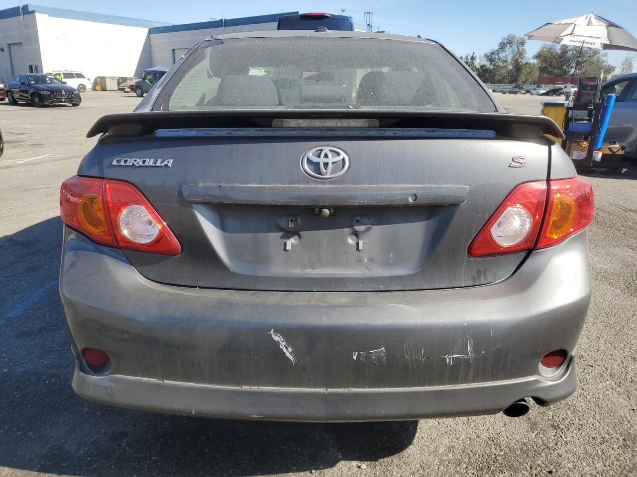 2010 Toyota Corolla VIN 2T1BU4EE7AC495572 Copart auction photo, side damage thumbnail 6