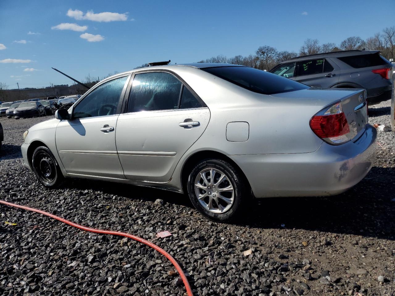 2005 Toyota Camry VIN 4T1BE32KX5U961193 Copart auction photo, side / front end damage thumbnail 2
