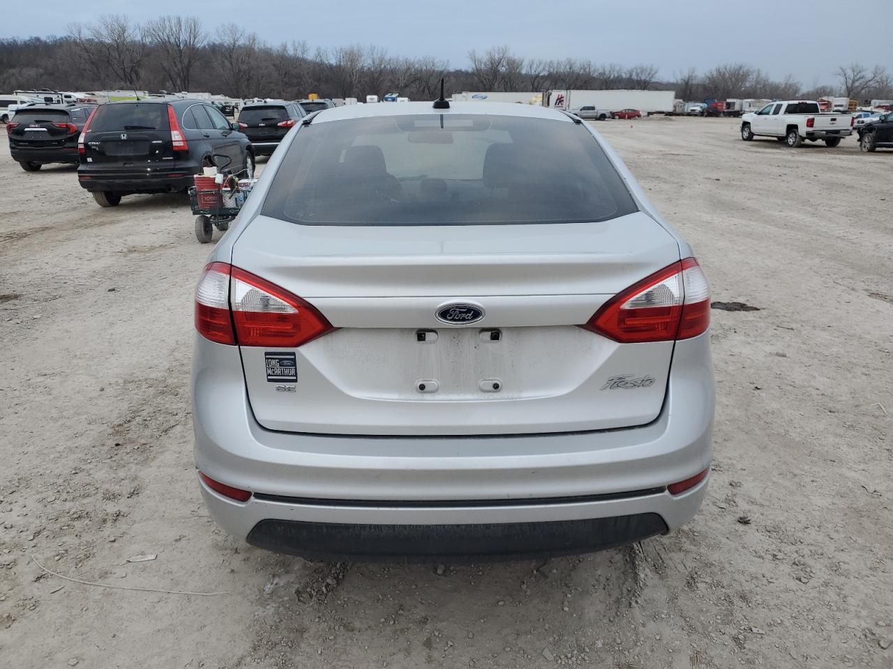 2016 Ford Fiesta VIN 3FADP4BJ2GM105615 Copart auction photo, side / minor dent/scratches damage thumbnail 6