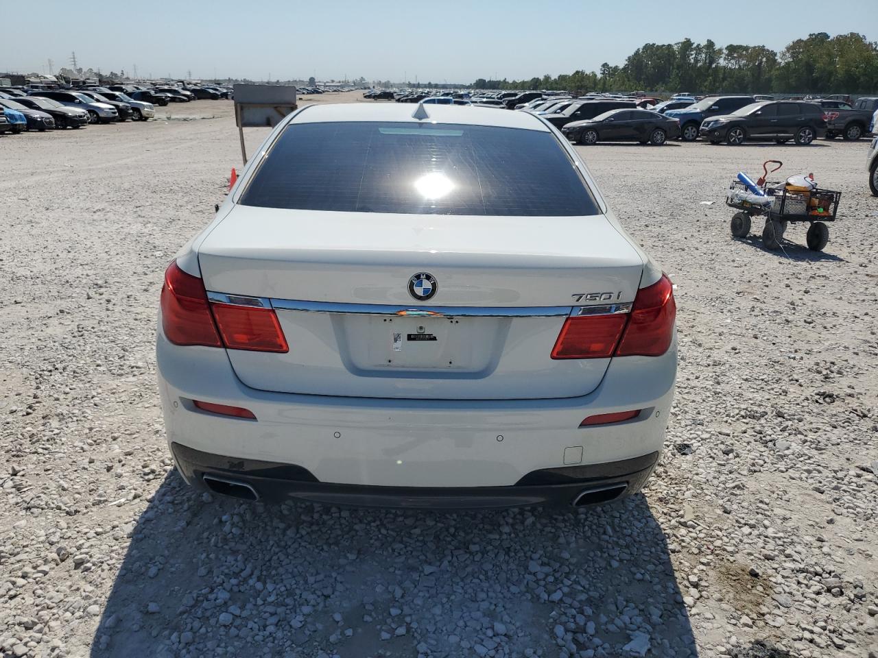 2012 BMW 7er VIN WBAKA8C57CDS99573 Copart auction photo, front end damage thumbnail 6