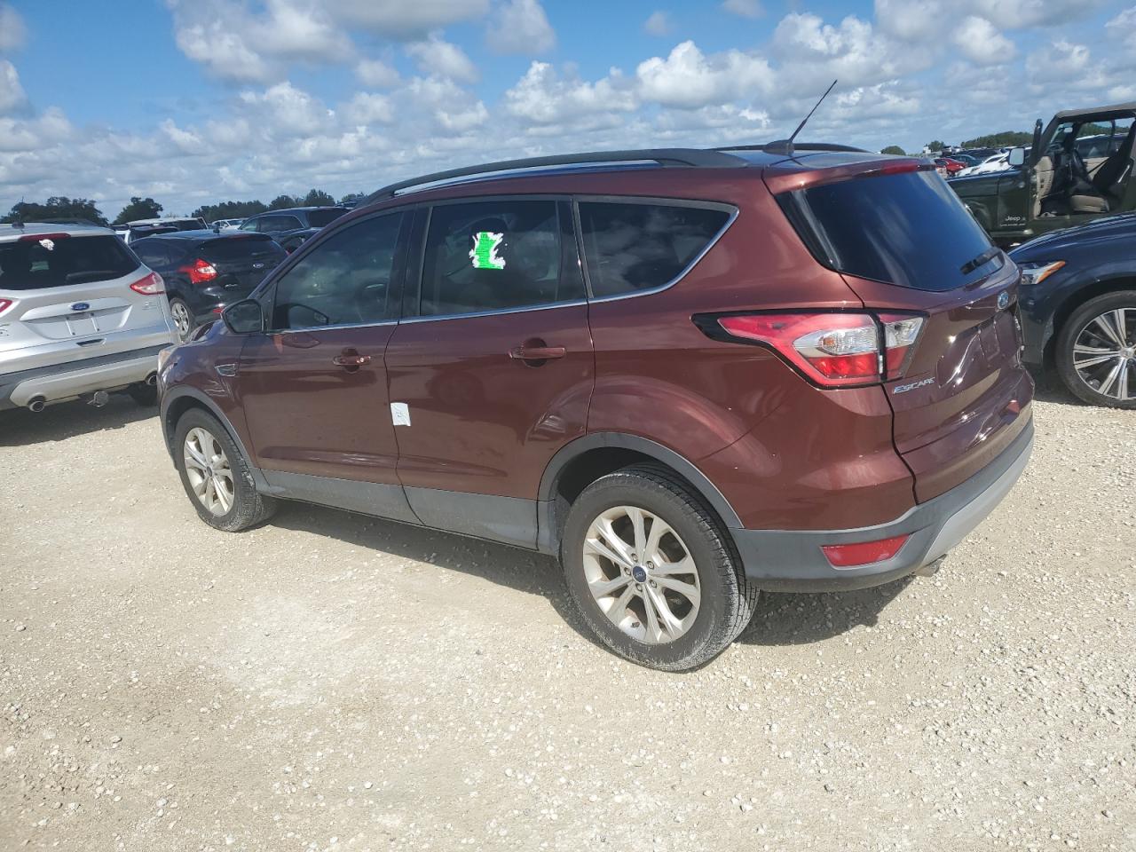 2018 Ford Escape VIN 1FMCU0GD7JUC11356 Copart auction photo, water/flood damage thumbnail 2