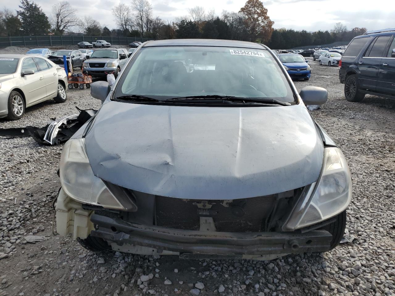 2012 Nissan Versa VIN 3N1BC1CP2CK299859 Copart auction photo, all over damage thumbnail 5