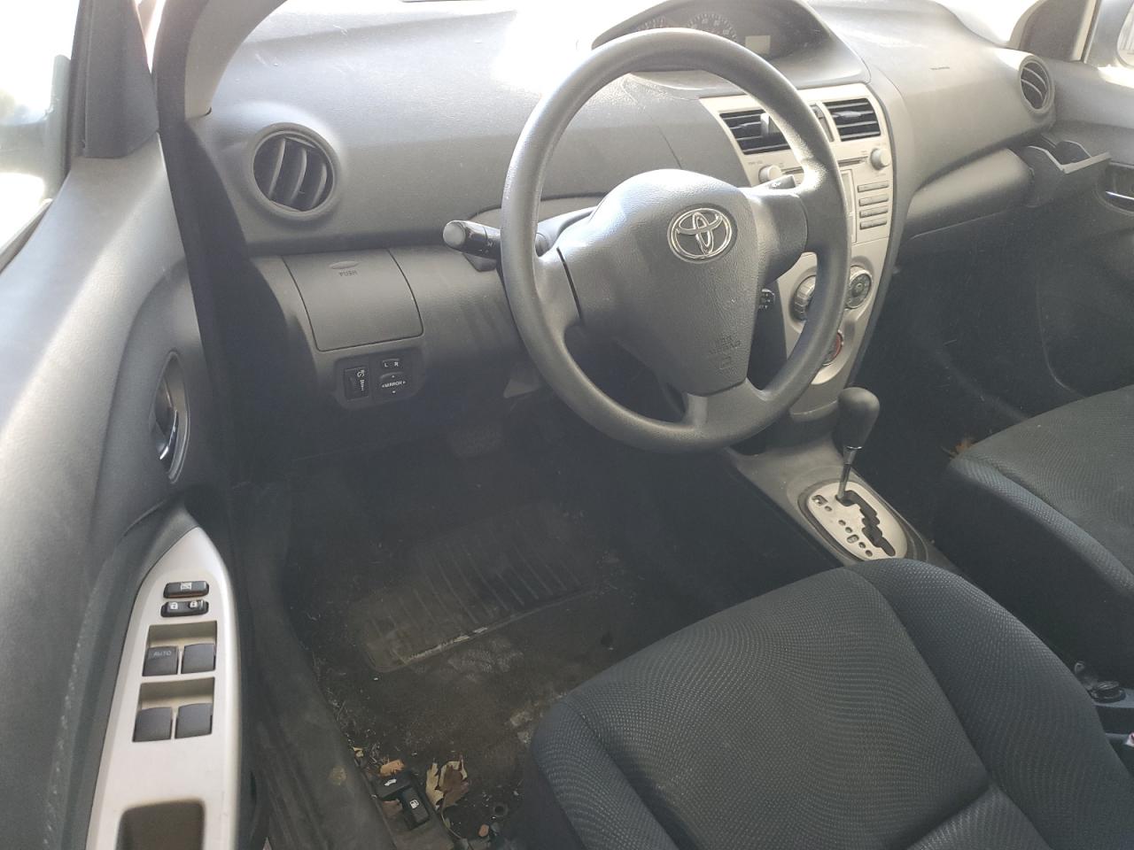 2010 Toyota Yaris VIN JTDBT4K32A1365810 Copart auction photo, rear end damage thumbnail 8