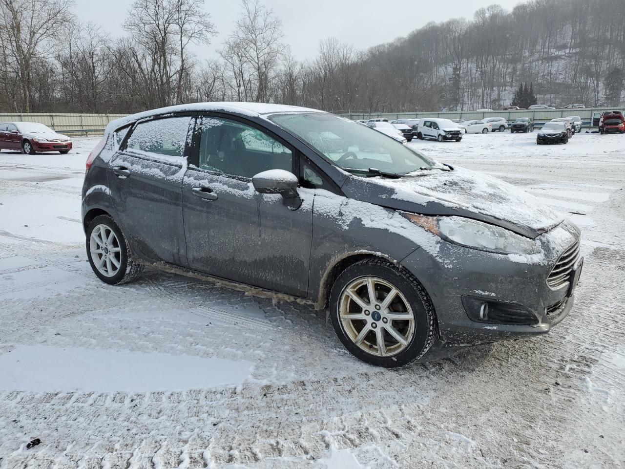 2019 Ford Fiesta VIN 3FADP4EJ9KM107401 Copart auction photo, front end / side damage thumbnail 4