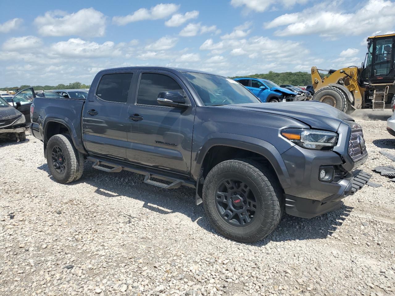 2021 Toyota Tacoma VIN 3TMGZ5AN8MM397312 Copart auction photo, all over damage thumbnail 4