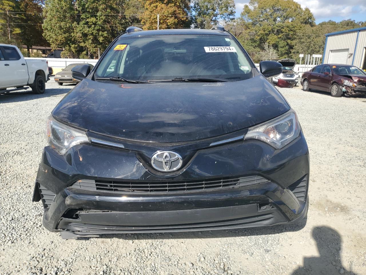 2016 Toyota RAV 4 VIN 2T3BFREV1GW525350 Copart auction photo, front end / side damage thumbnail 5