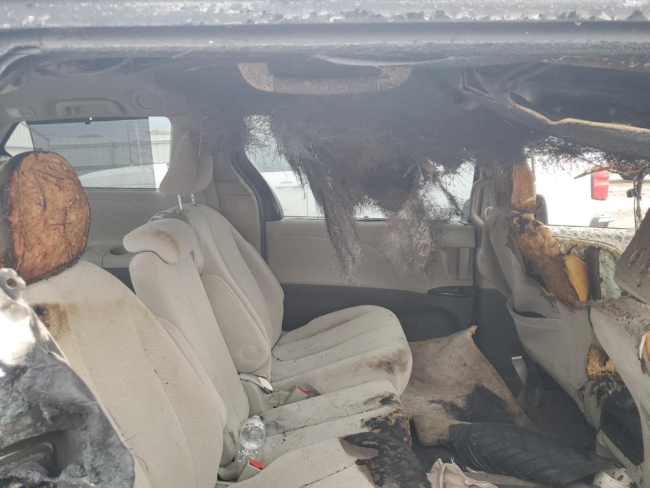 2011 Toyota Sienna VIN 5TDKK3DC7BS050497 Copart auction photo, burn damage thumbnail 11