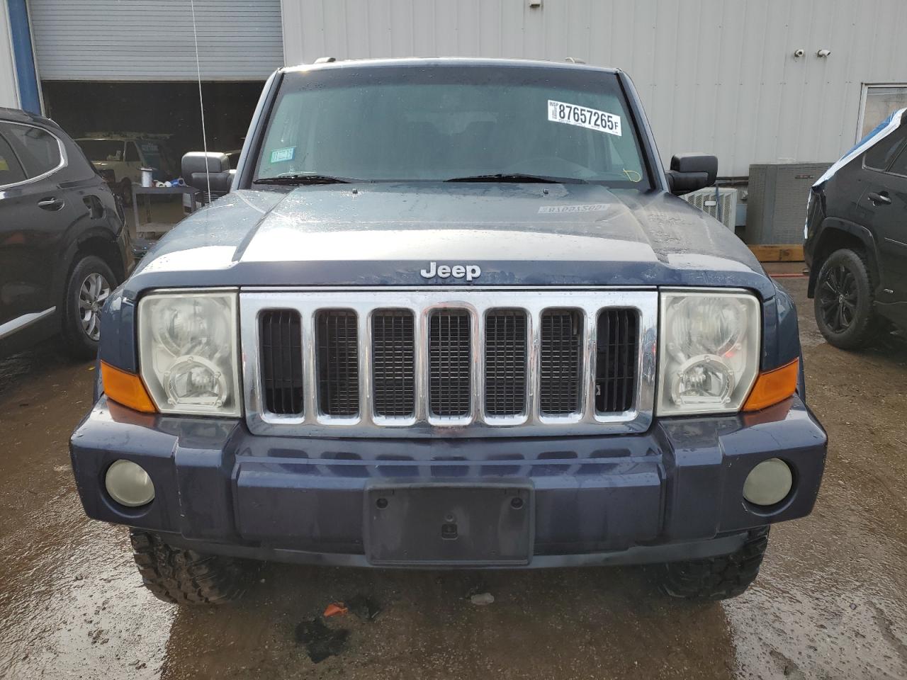 2010 Jeep Commander VIN 1J4RG4GK5AC119433 Copart auction photo, side / front end damage thumbnail 5