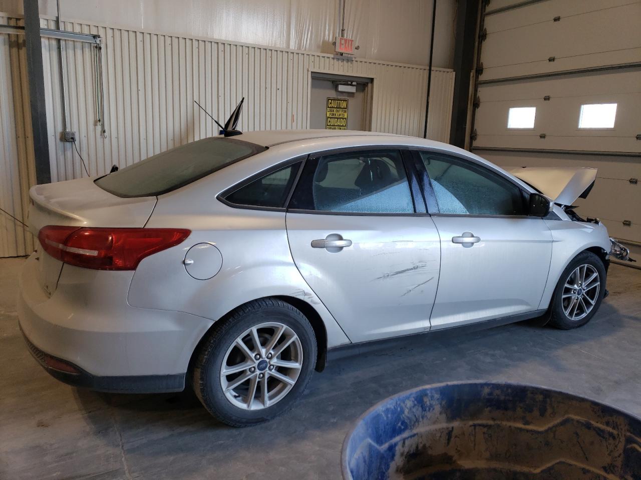 2016 Ford Focus VIN 1FADP3F23GL348722 Copart auction photo, all over damage thumbnail 3