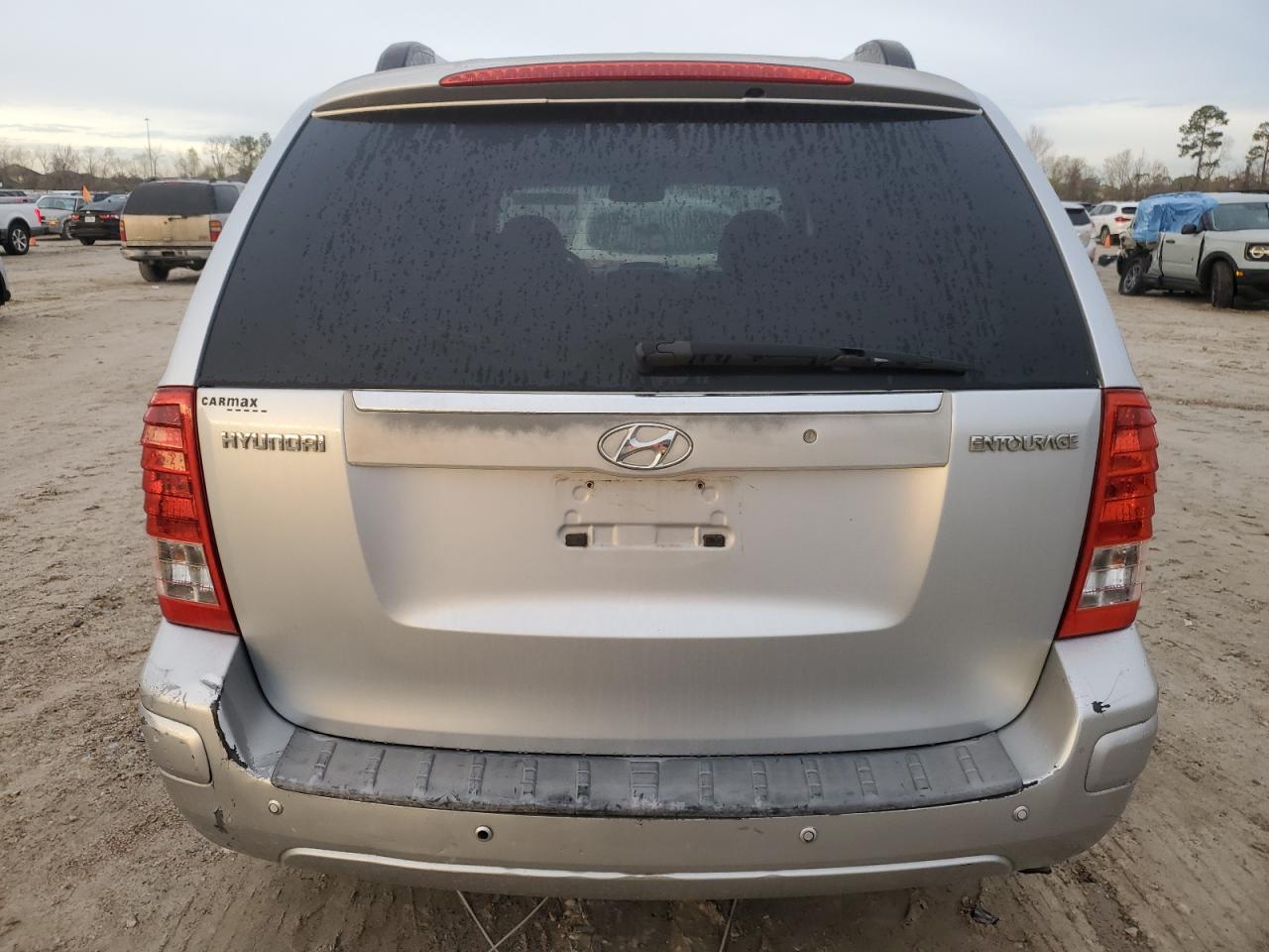 2007 Hyundai Entourage VIN KNDMC233076026857 Copart auction photo, front end / side damage thumbnail 6