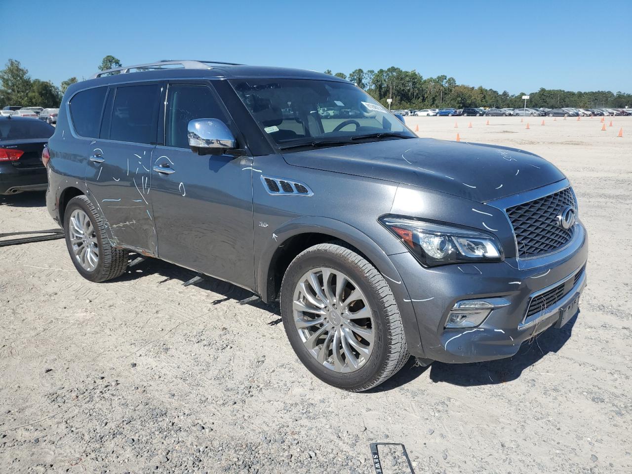 2015 Infiniti QX80 VIN JN8AZ2NF5F9570846 Copart auction photo, side / minor dent/scratches damage thumbnail 4