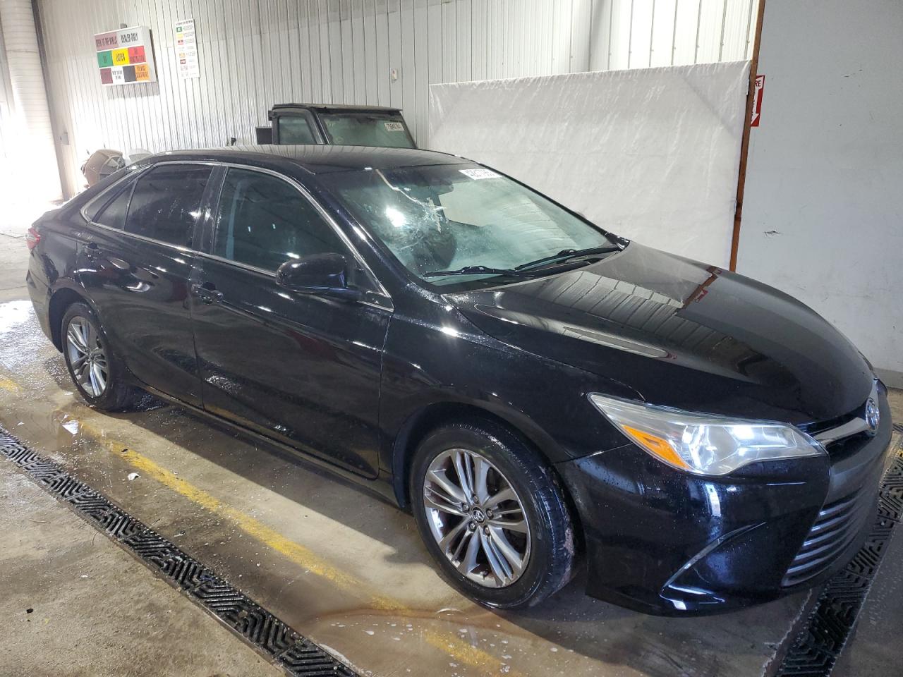 2016 Toyota Camry VIN 4T1BF1FK7GU599323 Copart auction photo, side / rear end damage thumbnail 4