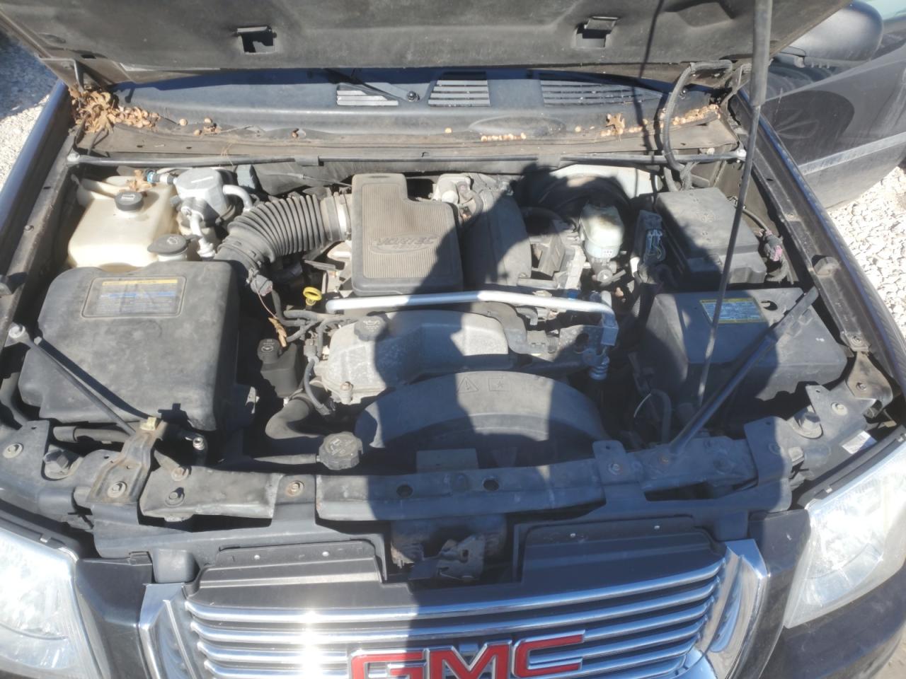2006 GMC Envoy VIN 1GKET16S466125461 Copart auction photo, rear end damage thumbnail 13