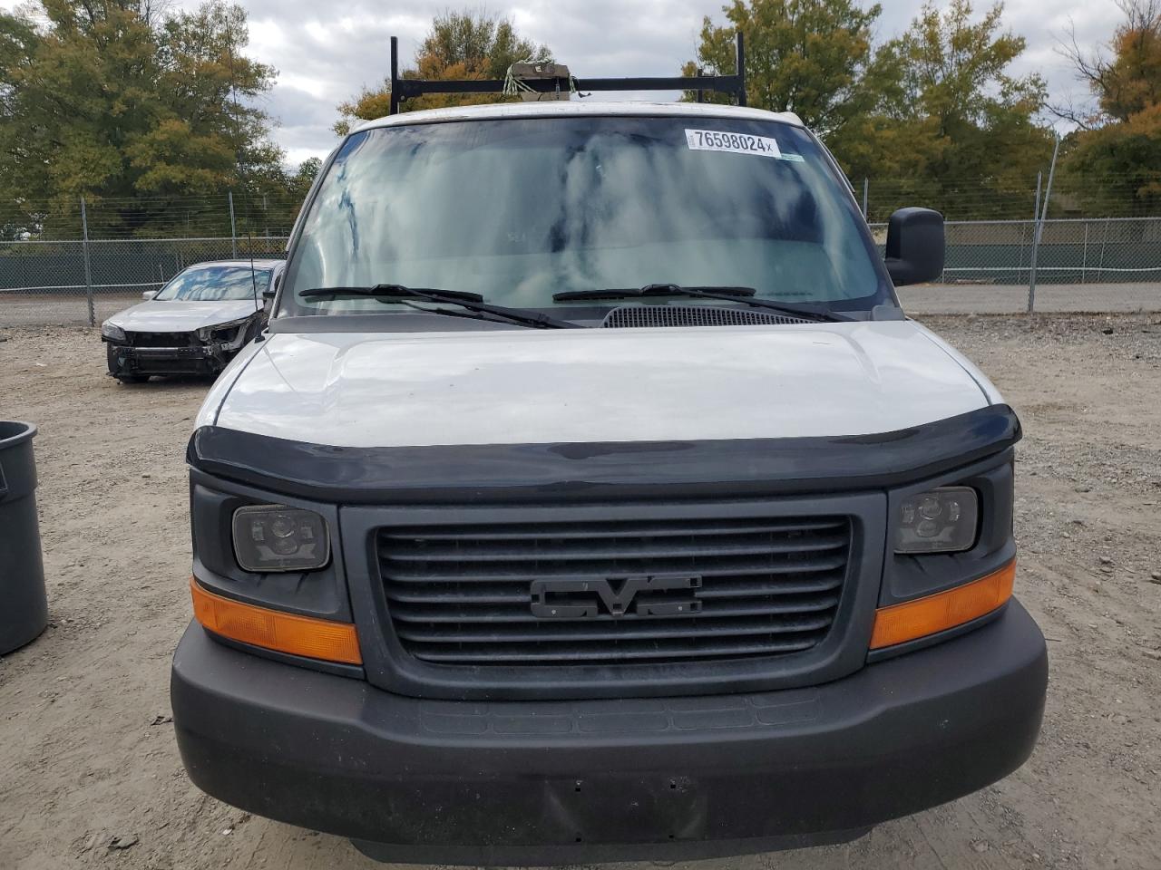 2013 GMC Savana VIN 1GTZ7TCA3D1121100 Copart auction photo, side / minor dent/scratches damage thumbnail 5