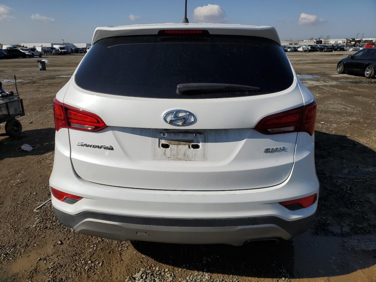 2018 Hyundai Santa Fe VIN 5NMZT3LB5JH067210 Copart auction photo, front end / side damage thumbnail 6