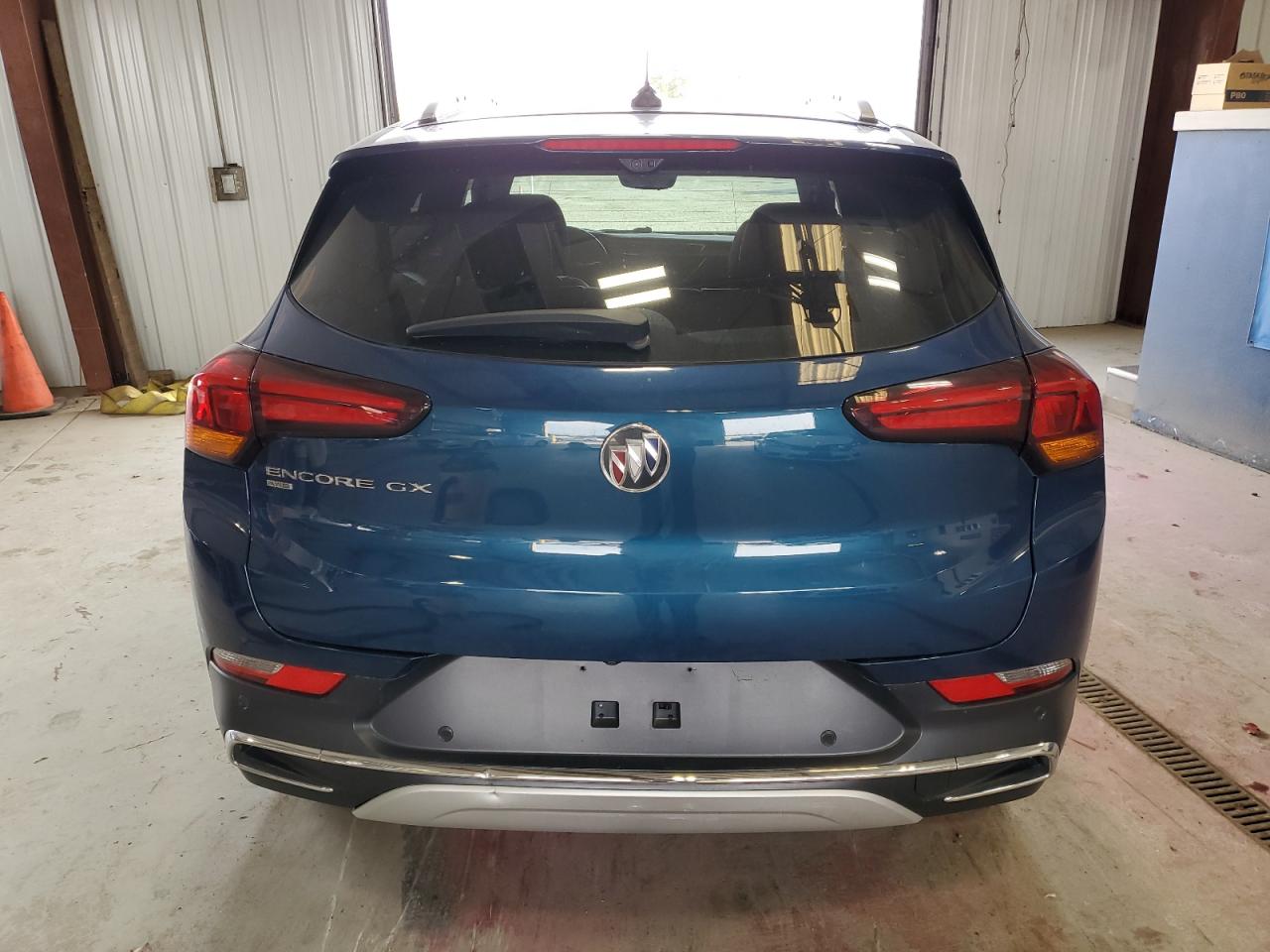 2020 Buick Encore VIN KL4MMGSL9LB130108 Copart auction photo, side damage thumbnail 6
