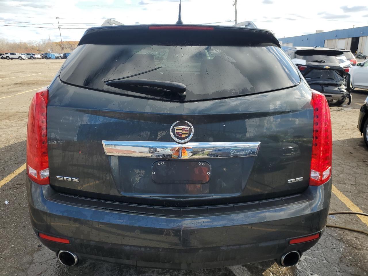 2014 Cadillac SRX VIN 3GYFNBE37ES563874 Copart auction photo, all over / mechanical damage thumbnail 6