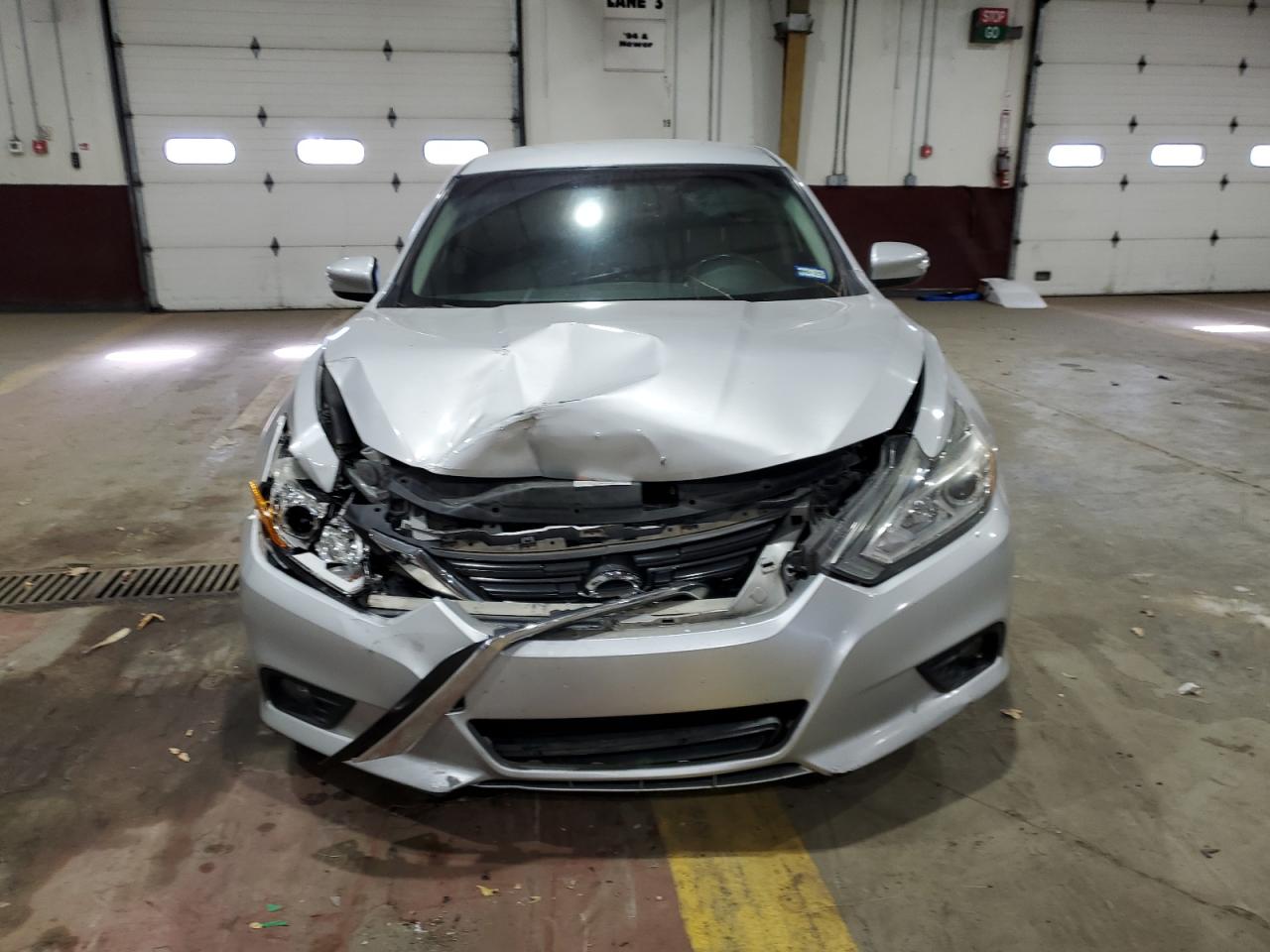 2017 Nissan Altima VIN 1N4AL3AP7HC162149 Copart auction photo, front end / minor dent/scratches damage thumbnail 5
