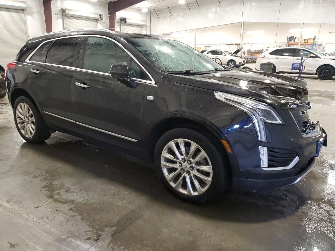 2017 Cadillac XT5 VIN 1GYKNFRS3HZ103951 Copart auction photo, front end damage thumbnail 4