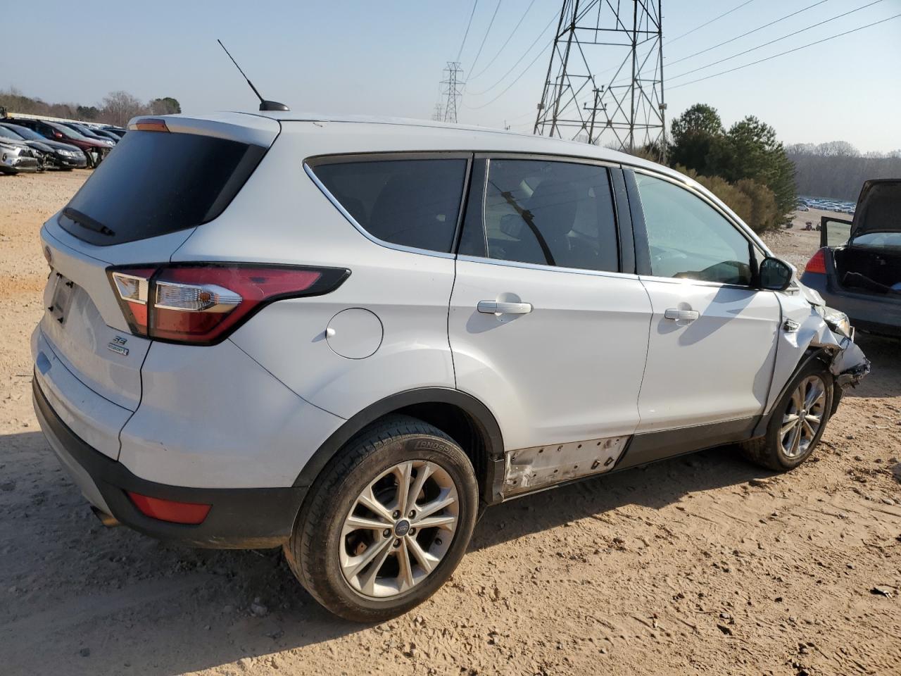 2017 Ford Escape VIN 1FMCU0GD1HUC72048 Copart auction photo, front end / side damage thumbnail 3