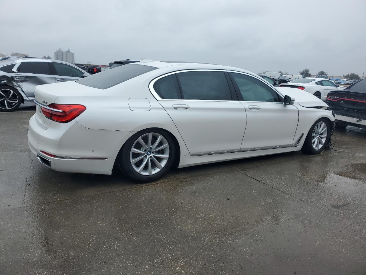 2017 BMW 7er VIN WBA7E2C55HG739366 Copart auction photo, front end damage thumbnail 3