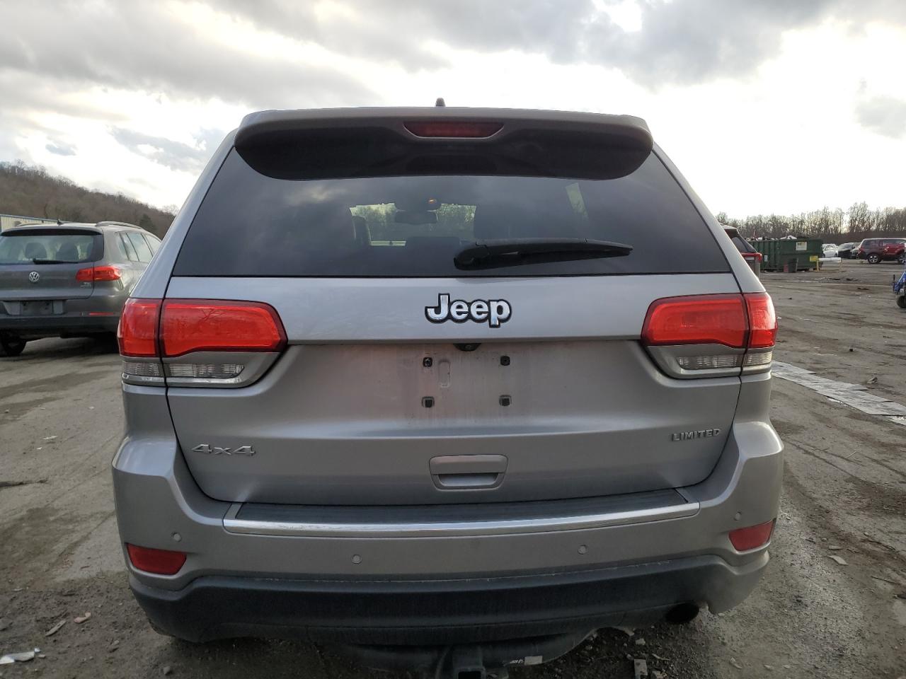 2015 Jeep Grand Cherokee VIN 1C4RJFBG4FC711743 Copart auction photo, front end / side damage thumbnail 6