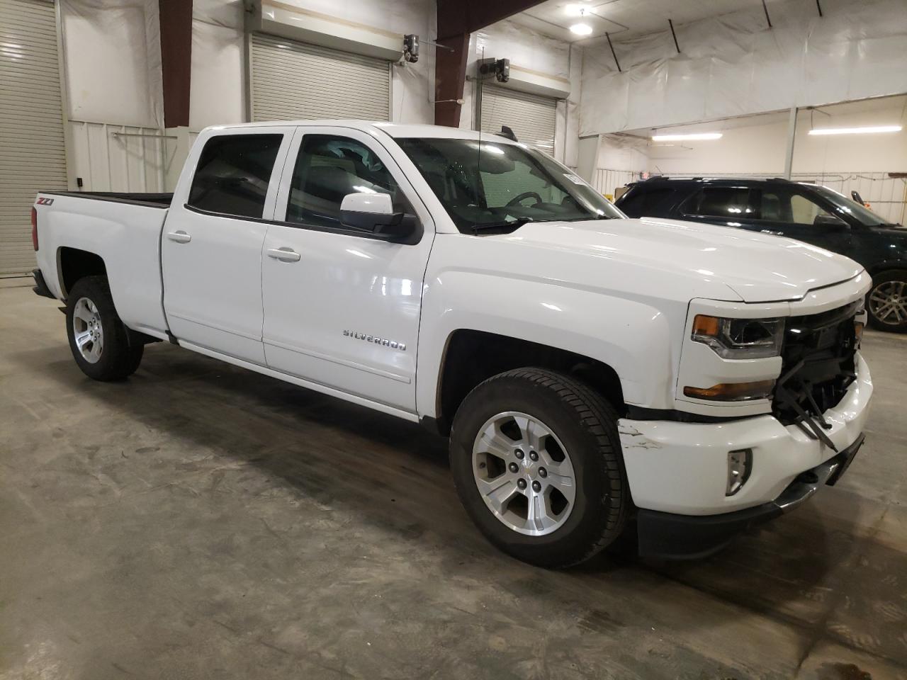 2018 Chevrolet Silverado VIN 1GCUKREC1JF138650 Copart auction photo, front end / hail damage thumbnail 4