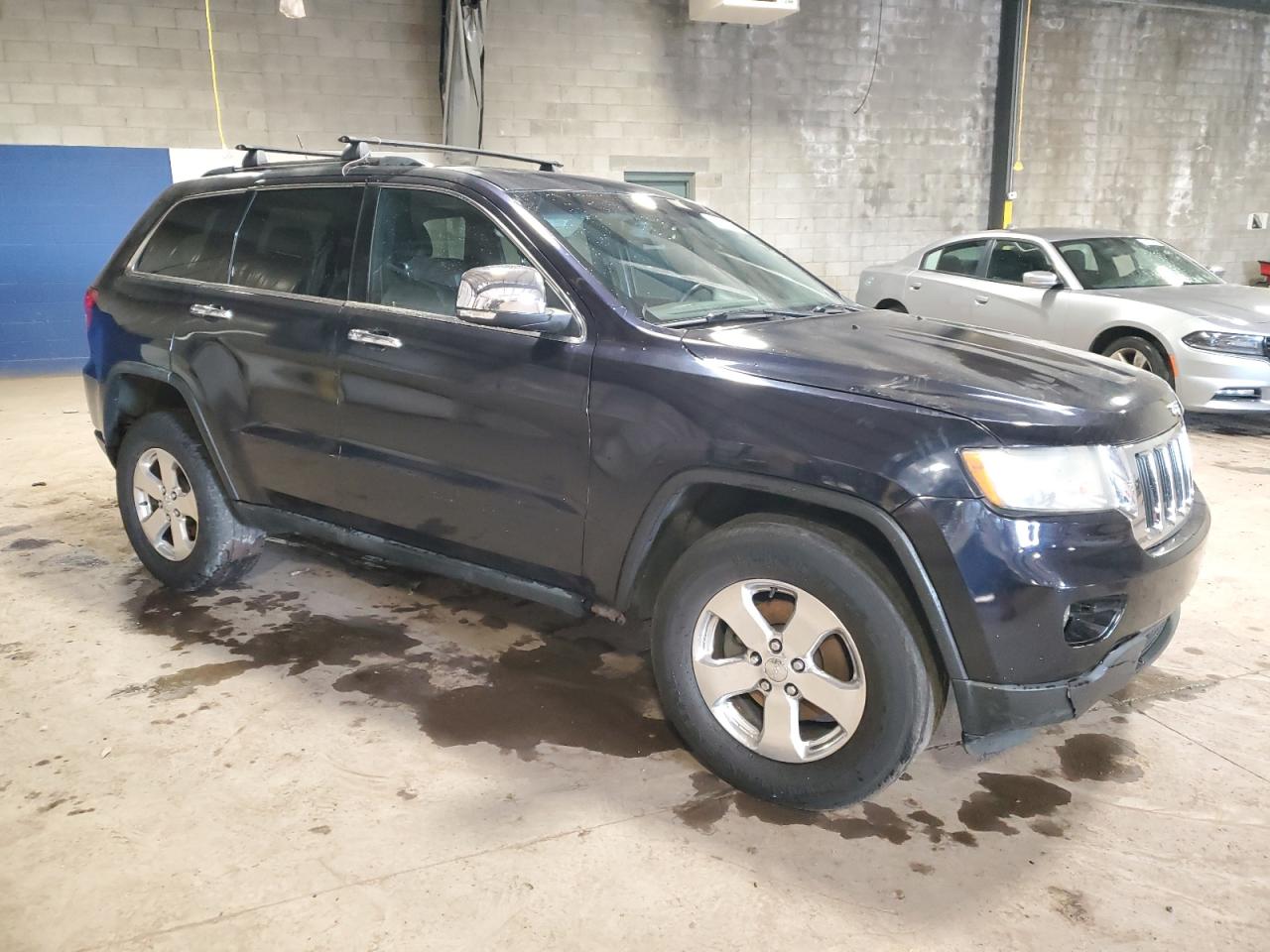 2011 Jeep Grand Cherokee VIN 1J4RR5GG3BC528804 Copart auction photo, side / front end damage thumbnail 4