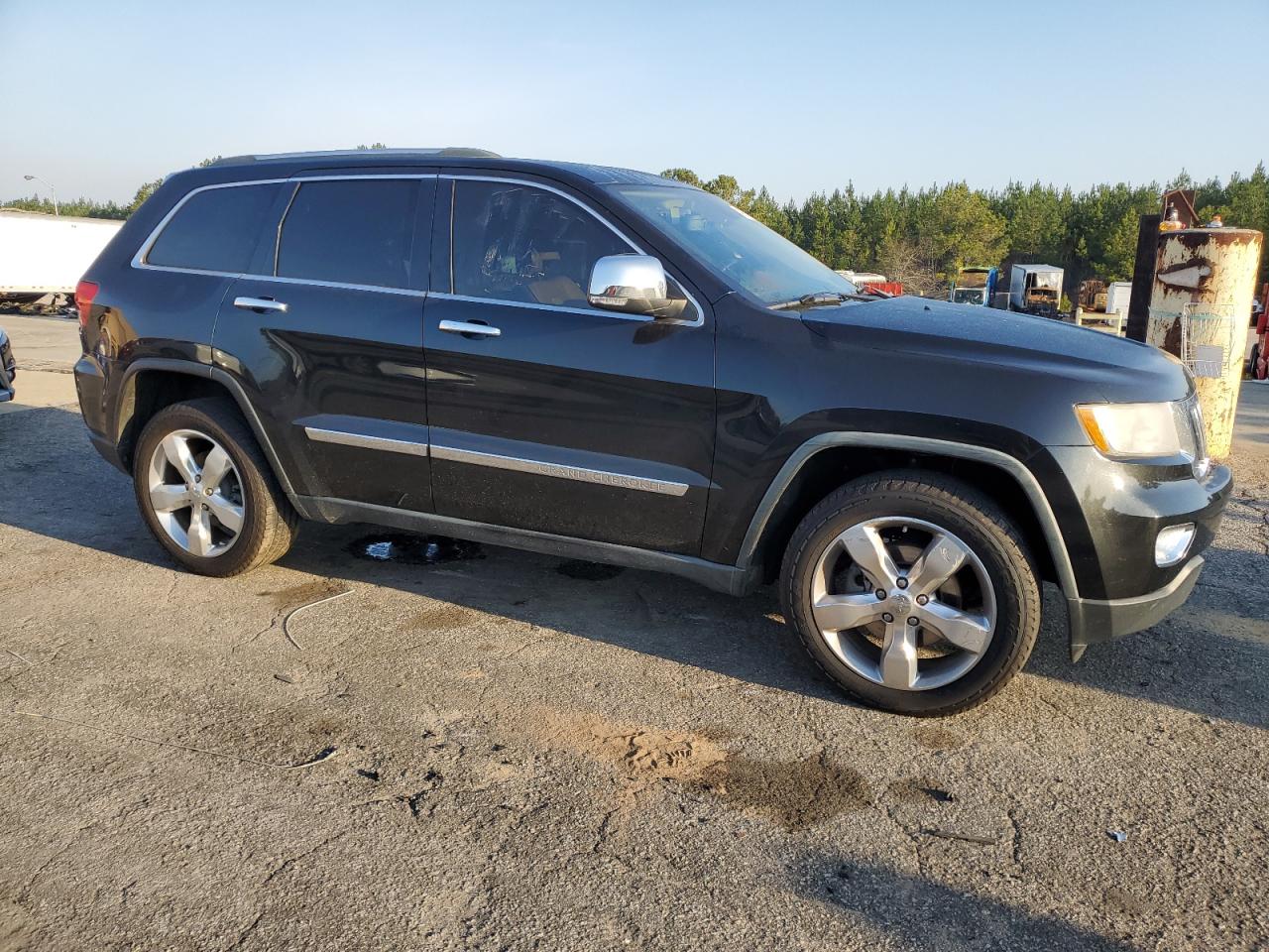 2011 Jeep Grand Cherokee VIN 1J4RS6GT5BC648076 Copart auction photo, front end damage thumbnail 4