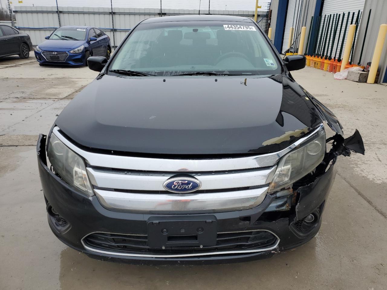 2011 Ford Fusion VIN 3FAHP0HA6BR128957 Copart auction photo, front end damage thumbnail 5