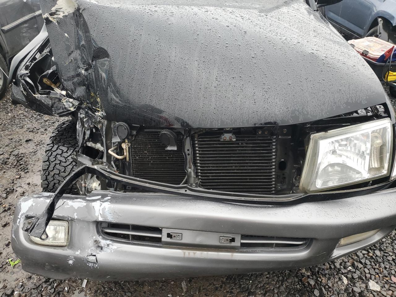 1998 Toyota Land Cruiser VIN JT3HT05J7W0009769 Copart auction photo, front end damage thumbnail 12