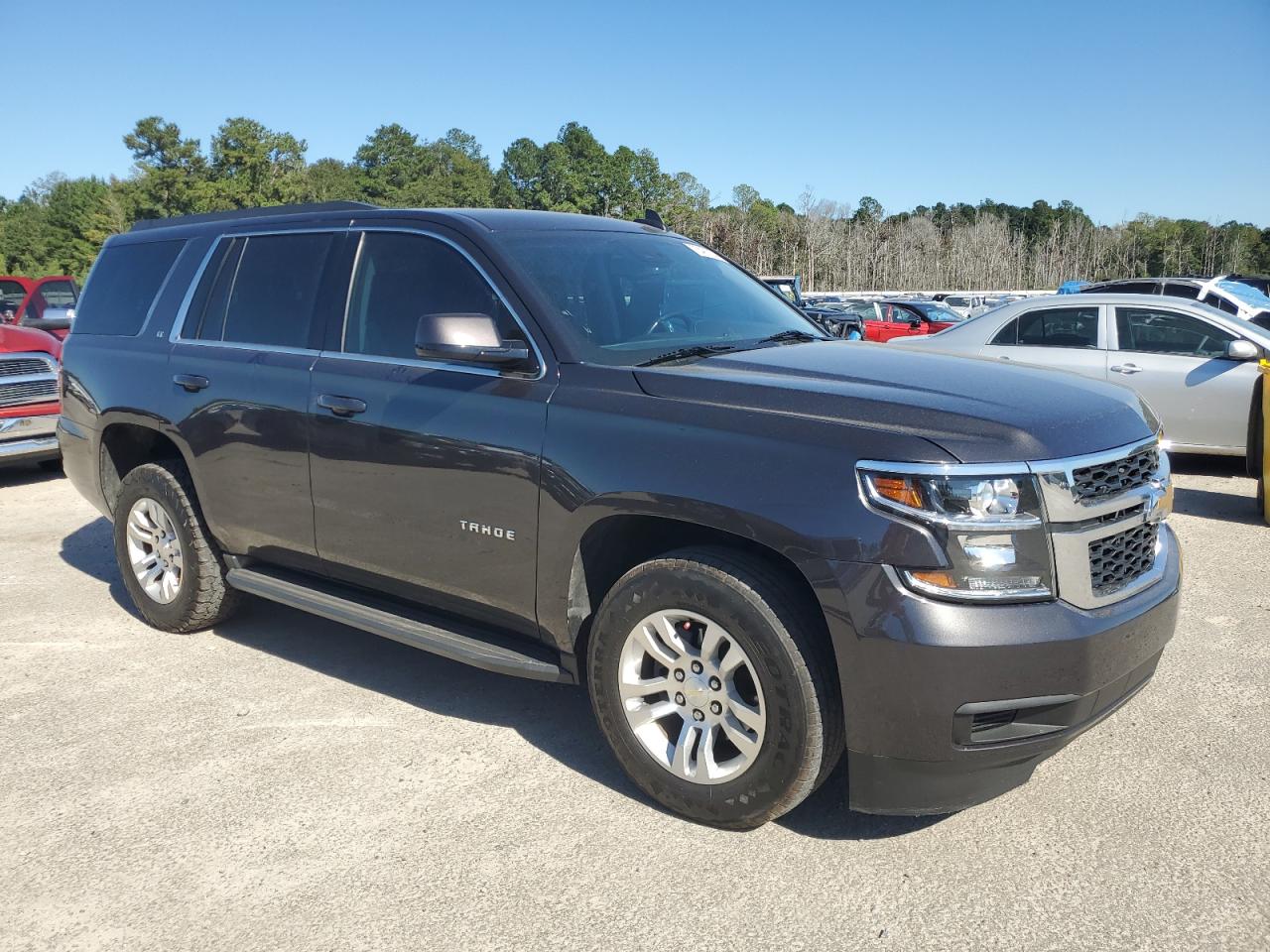 2018 Chevrolet Tahoe VIN 1GNSCBKC7JR114147 Copart auction photo, minor dent/scratches damage thumbnail 4