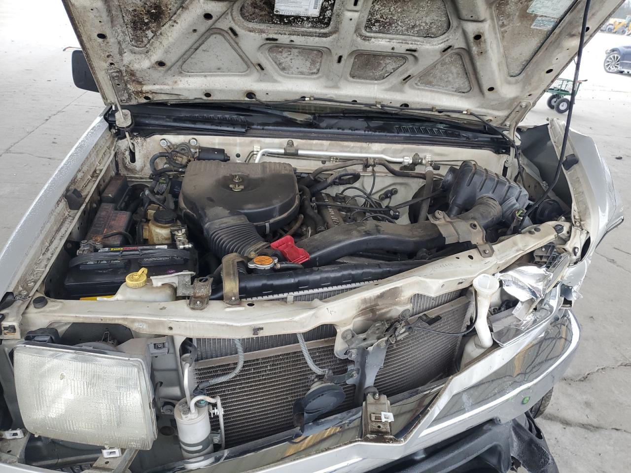 1999 Nissan Navara (Frontier) VIN 1N6DD26SXXC344449 Copart auction photo, front end / minor dent/scratches damage thumbnail 12