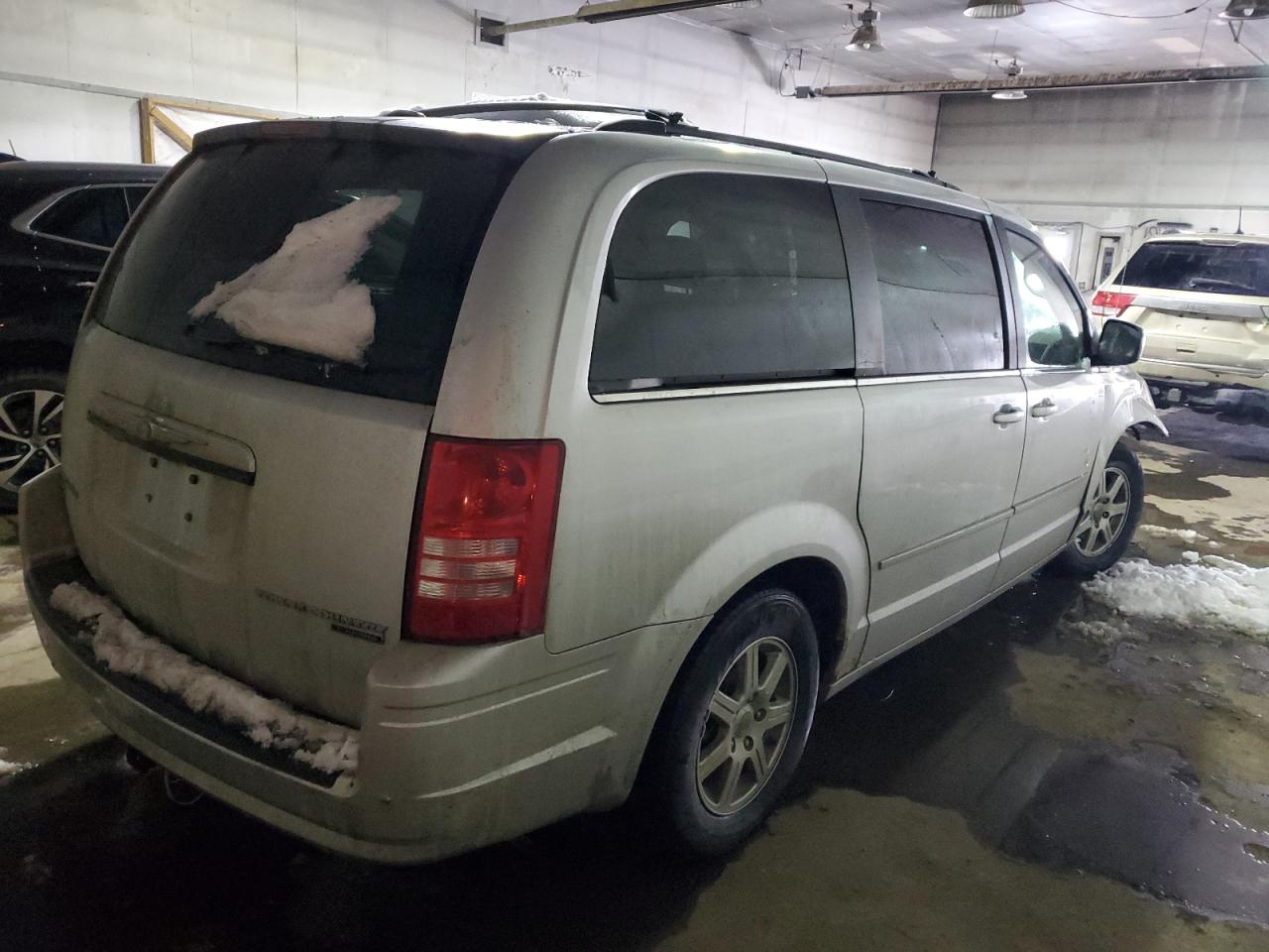 2010 Chrysler Town & Country VIN 2A4RR8DX7AR368437 Copart auction photo, front end damage thumbnail 3