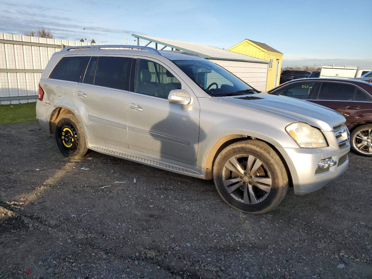 2010 Mercedes-Benz GL-klasse VIN 4JGBF7BE0AA545325 Copart auction photo, side / rear end damage thumbnail 4