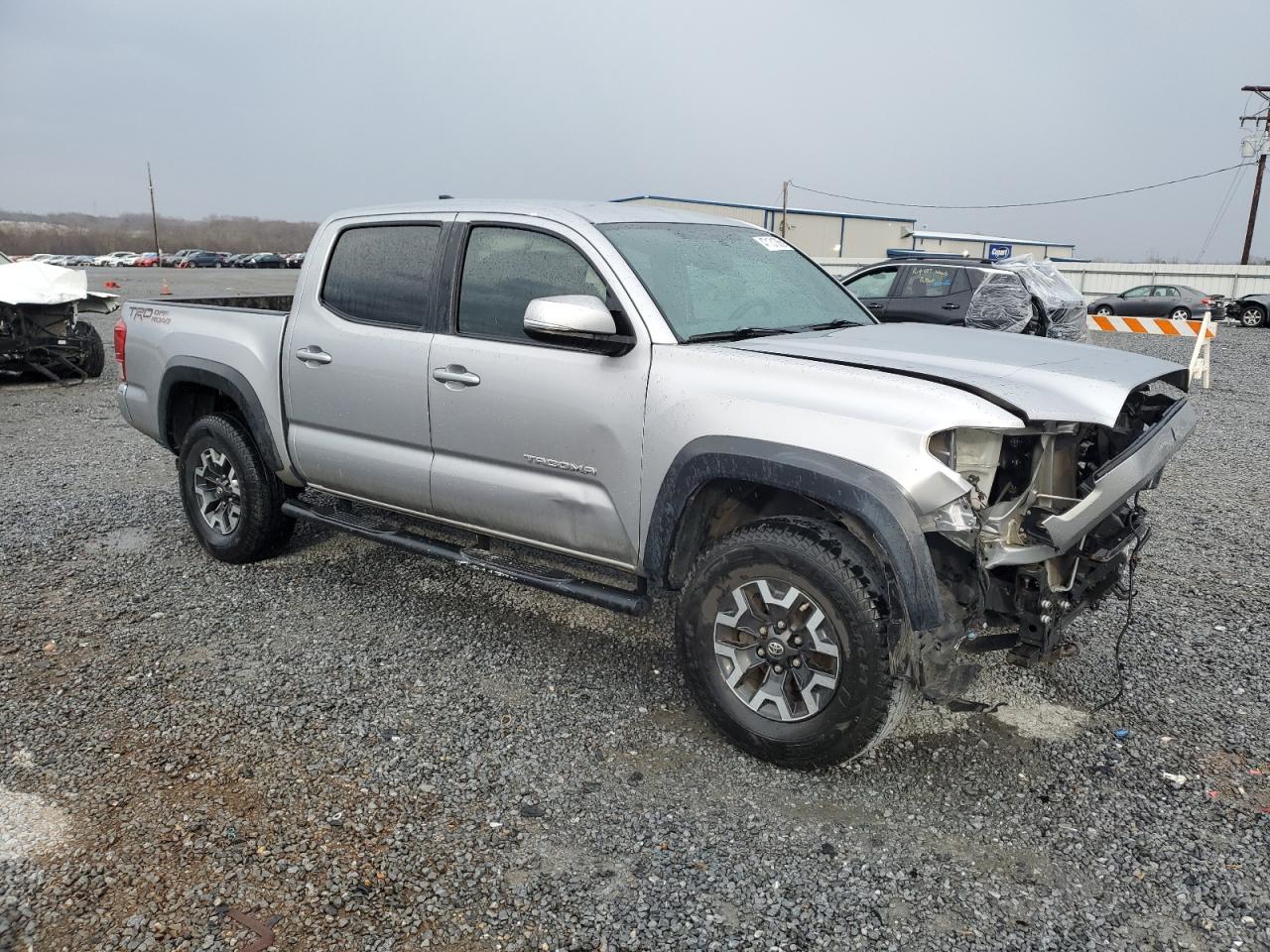 2016 Toyota Tacoma VIN 5TFAZ5CN1GX004056 Copart auction photo, front end / side damage thumbnail 4