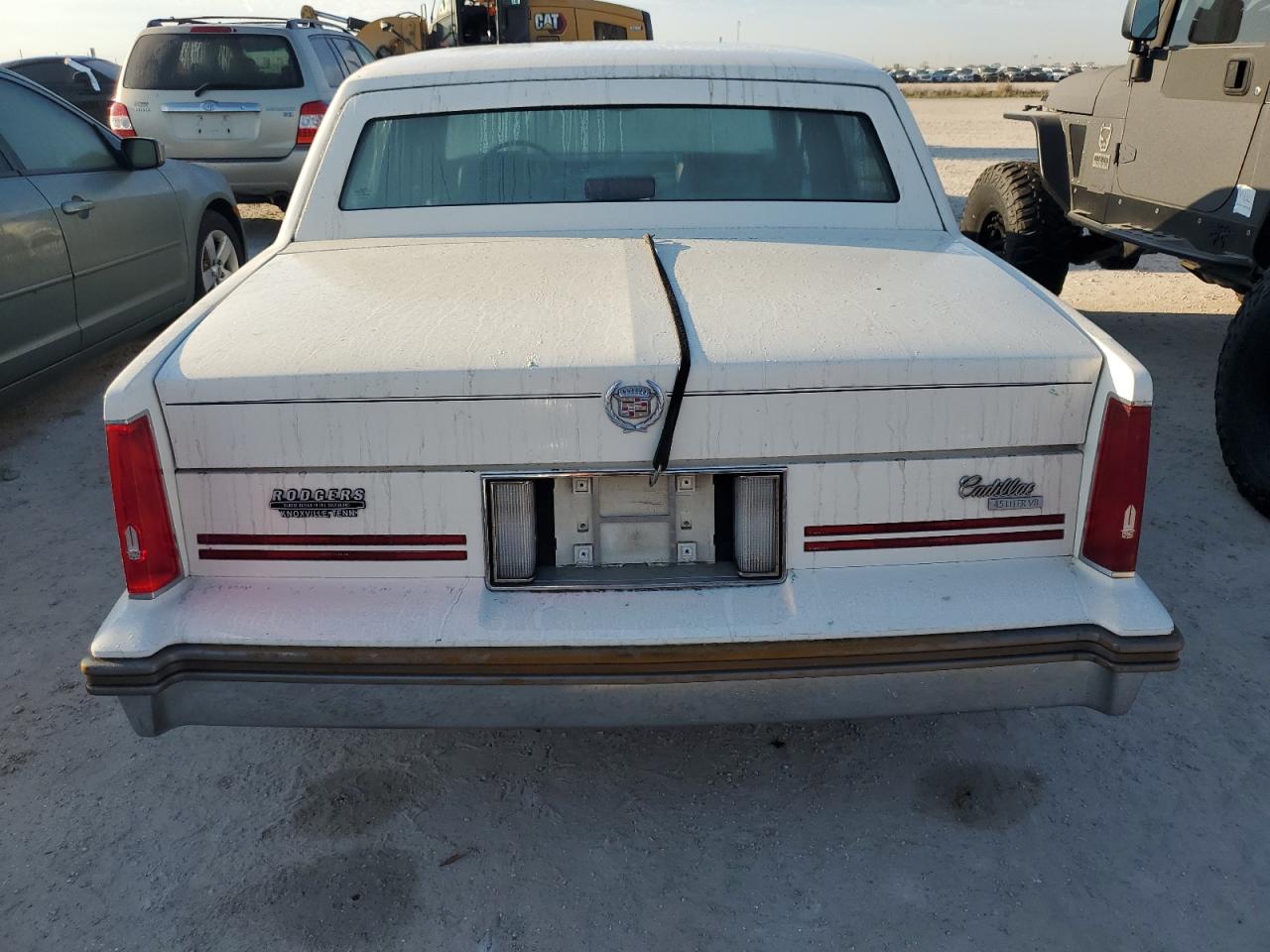 1988 Cadillac De Ville VIN 1G6CD5157J4214845 Copart auction photo, water/flood damage thumbnail 6