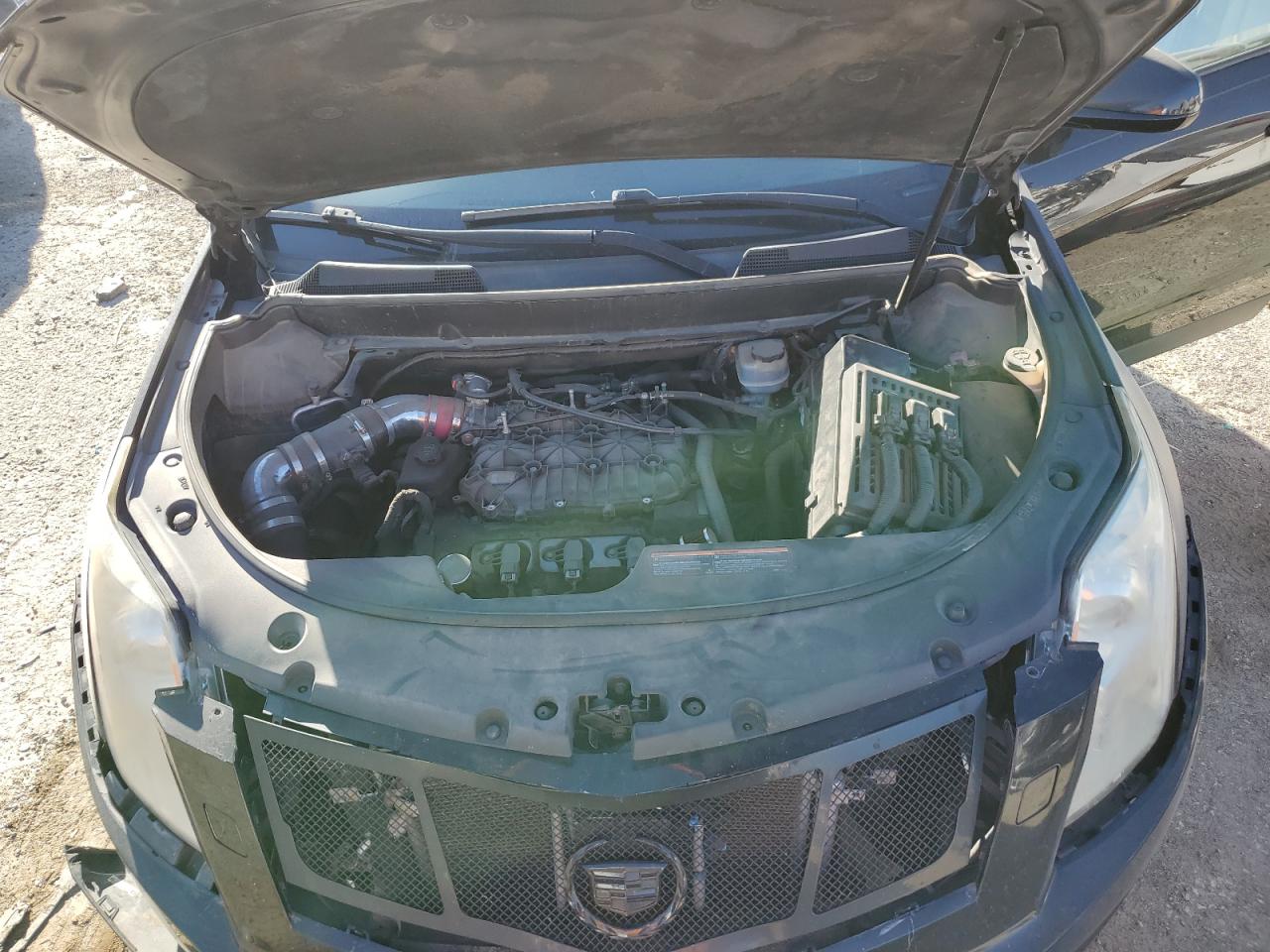 2013 Cadillac SRX VIN 3GYFNEE39DS609477 Copart auction photo, front end damage thumbnail 13