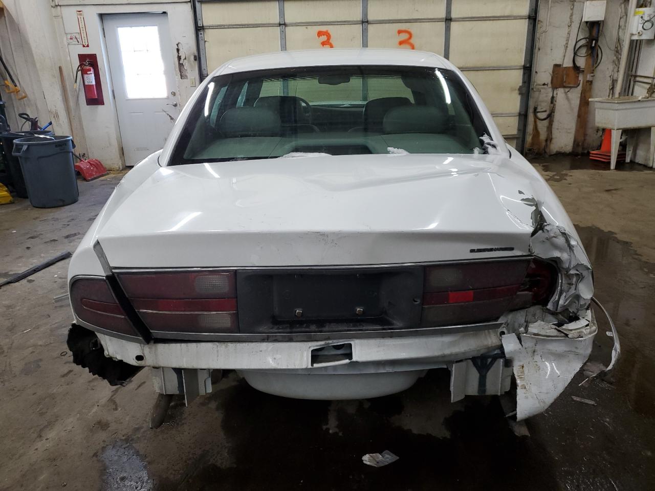1999 Buick Park Avenue VIN 1G4CU5216X4660725 Copart auction photo, all over damage thumbnail 6