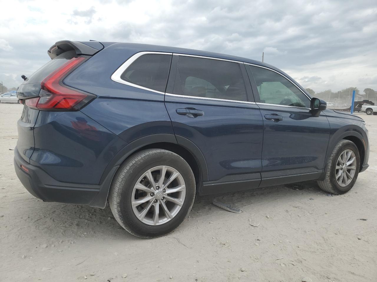 2023 Honda CR-V VIN 7FARS3H79PE010644 Copart auction photo, front end / minor dent/scratches damage thumbnail 3