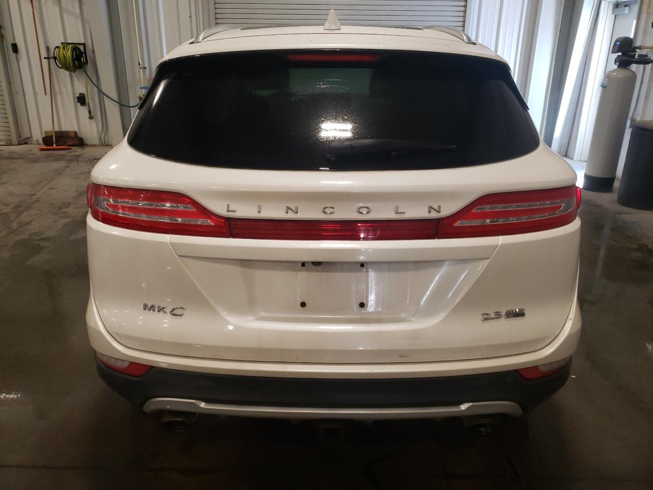 2015 Lincoln MKZ VIN 5LMTJ2AH5FUJ15147 Copart auction photo, front end / side damage thumbnail 6