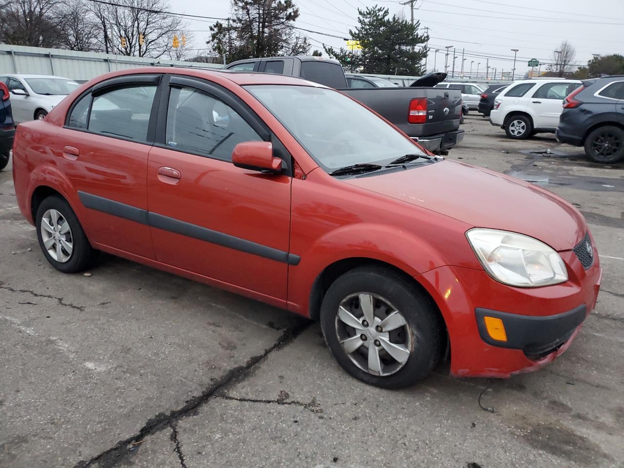 2009 KIA Rio VIN KNADE223X96560282 Copart auction photo, all over / undercarriage damage thumbnail 4