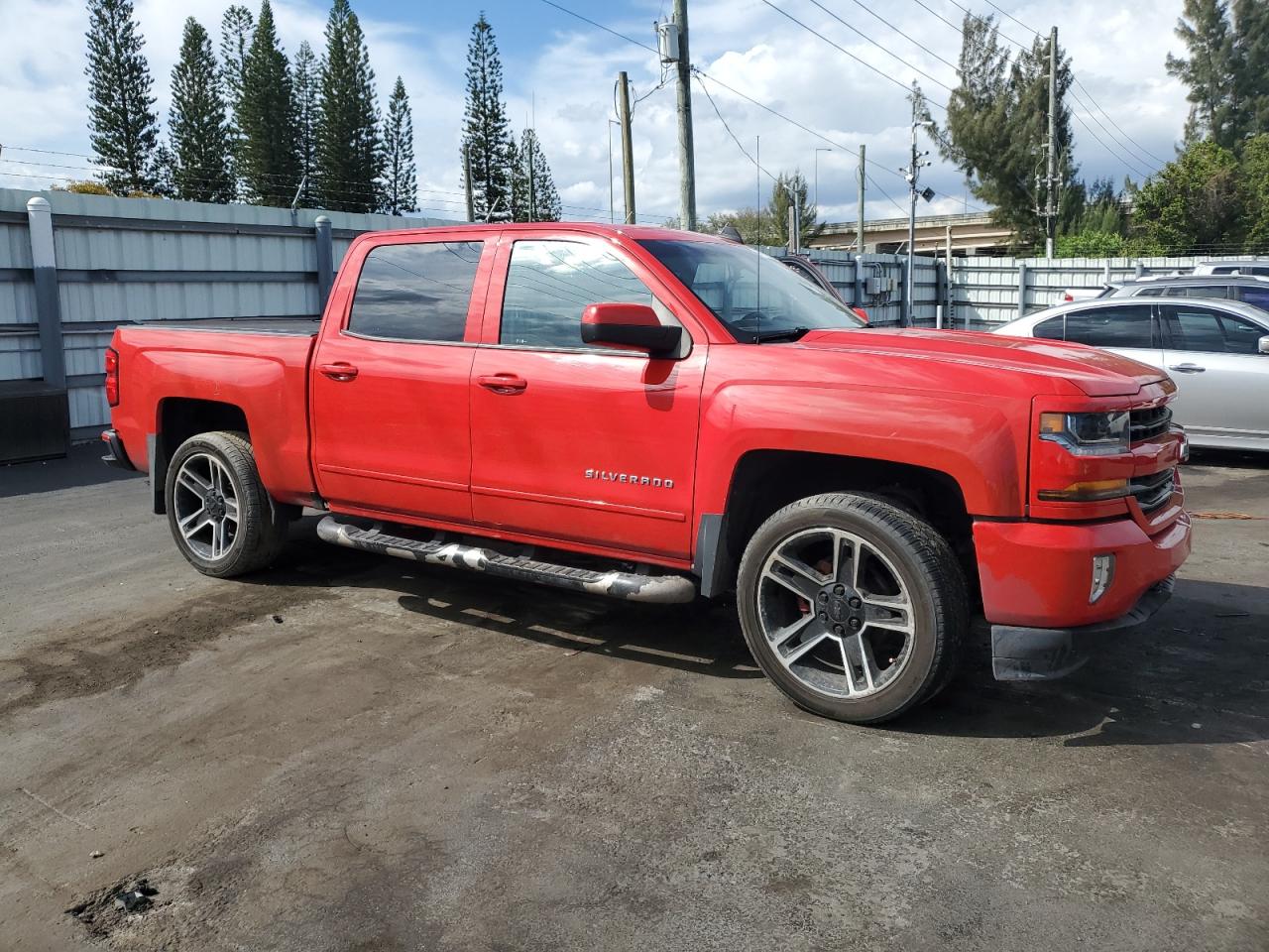 2018 Chevrolet Silverado VIN 3GCUKREC9JG413275 Copart auction photo, front end / side damage thumbnail 4