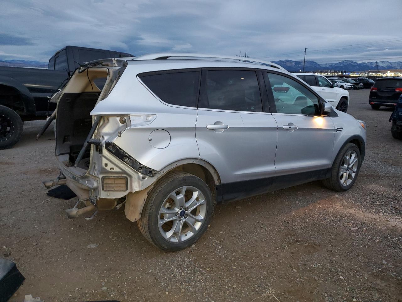 2016 Ford Escape VIN 1FMCU9J95GUA40110 Copart auction photo, rear end / side damage thumbnail 3