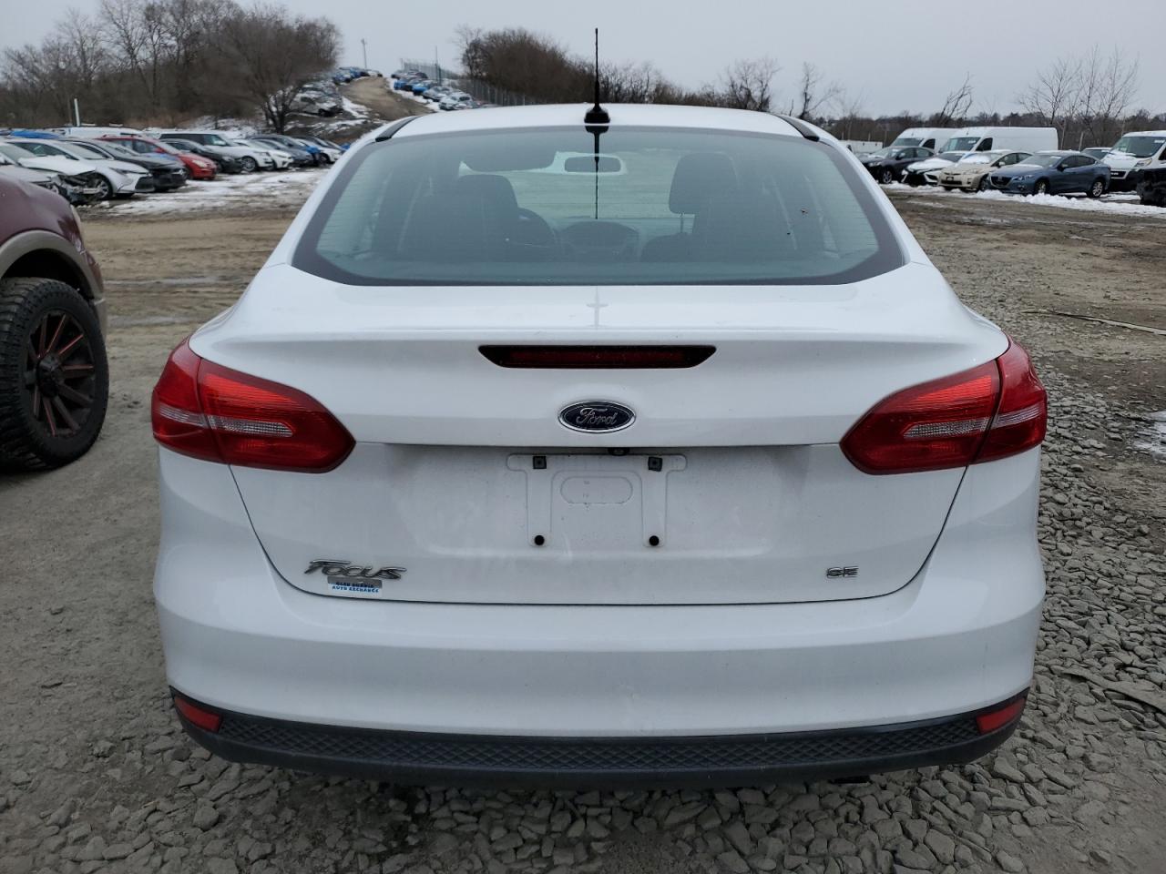 2016 Ford Focus VIN 1FADP3F27GL239132 Copart auction photo, front end damage thumbnail 6